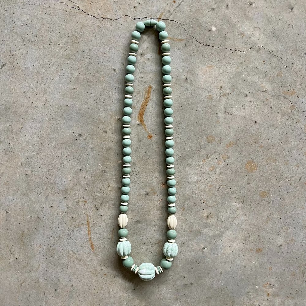 Vintage '60s carved lucite necklace